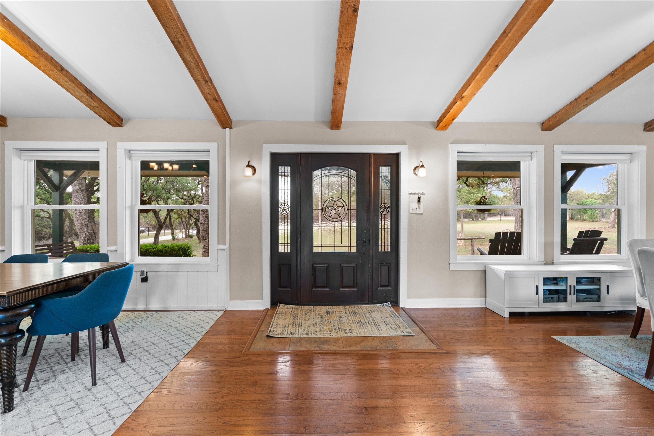 720 Circle G Ranch Road Austin, TX 78737 - Photo 8 of 37 a view of a hallway with furniture and window