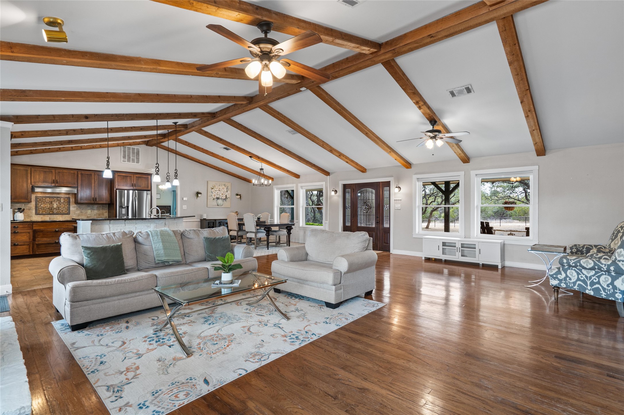 720 Circle G Ranch Road Austin, TX 78737 - Photo 10 of 37 a living room with furniture and wooden floor