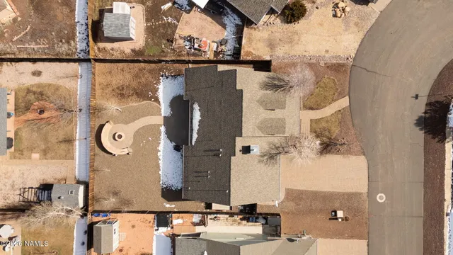 an aerial view of a highlighted house