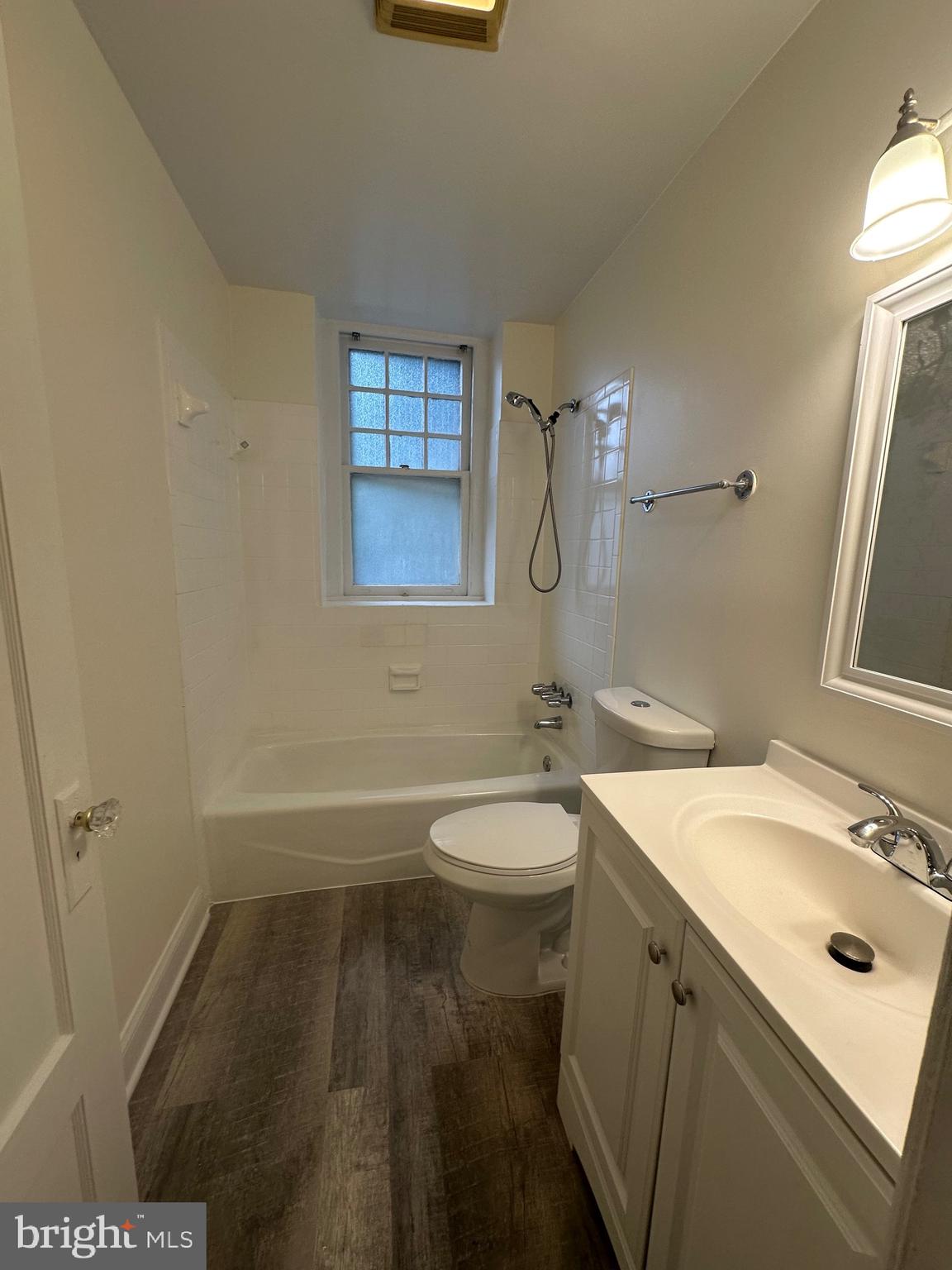 3420 16th Street Northwest, Unit 103 Washington, DC 20010 - Photo 23 of 24 a bathroom with a sink a toilet and shower