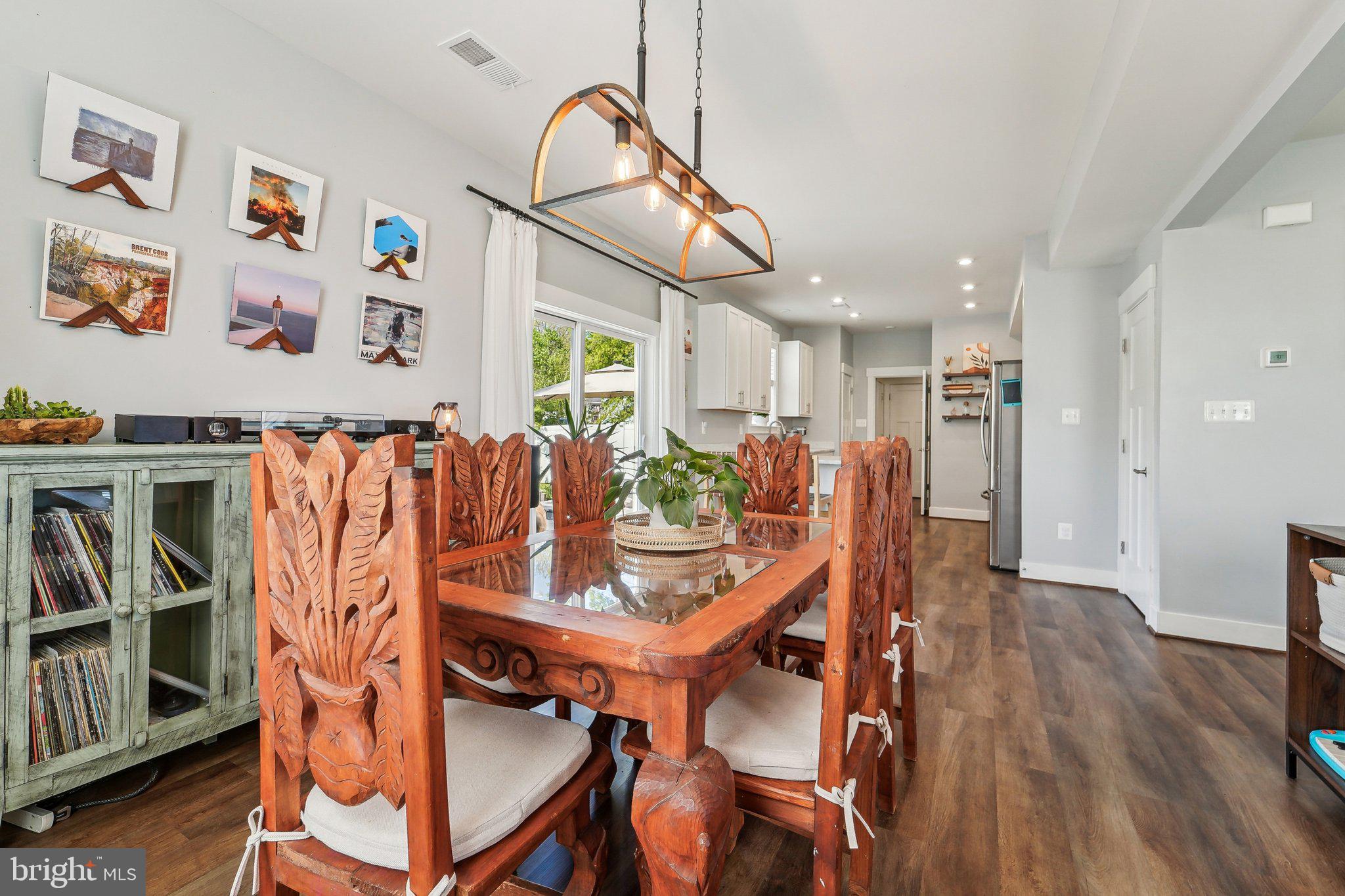 531 Highmeadow Drive Severn, MD 21144 - Photo 11 of 37 a view of a dining room with furniture and wooden floor
