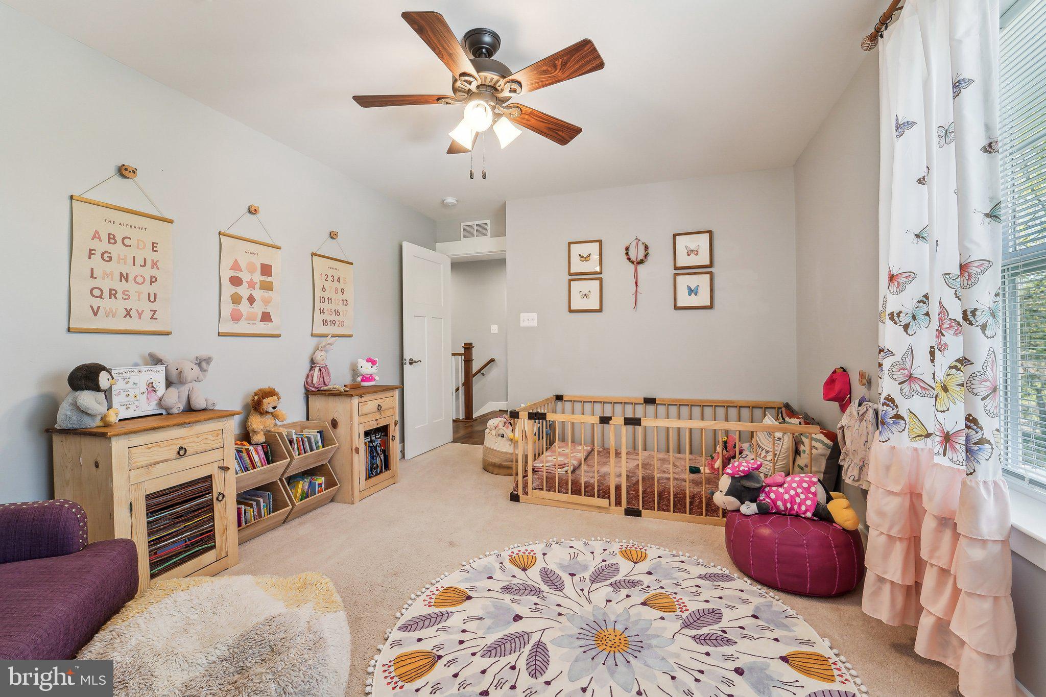 531 Highmeadow Drive Severn, MD 21144 - Photo 19 of 37 a bedroom with furniture and a chandelier fan