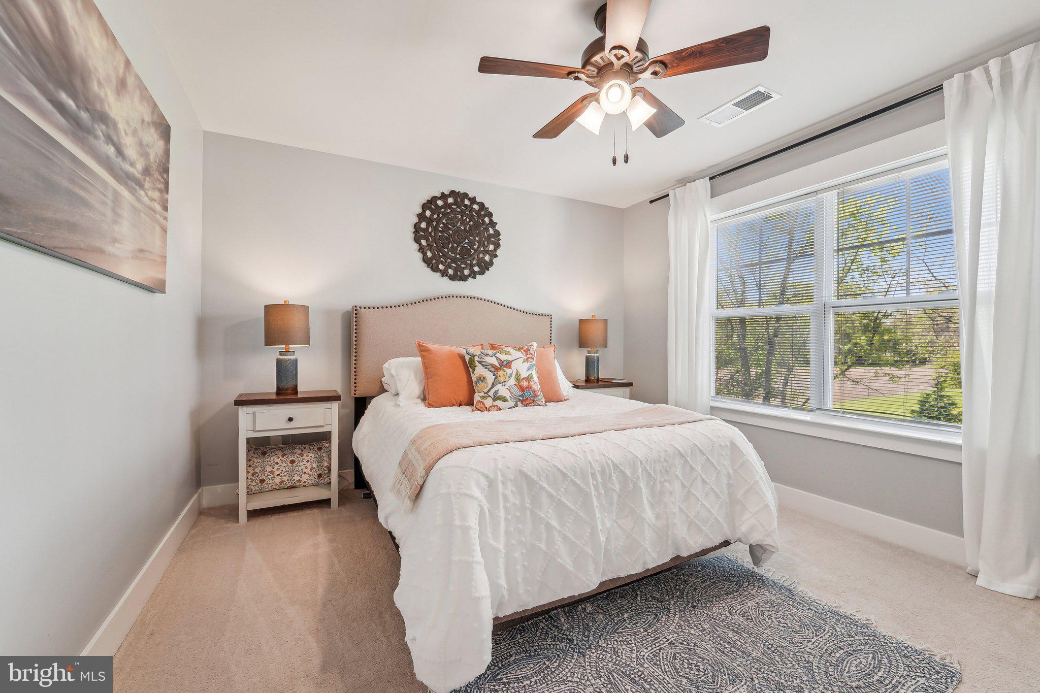 531 Highmeadow Drive Severn, MD 21144 - Photo 25 of 37 a bedroom with a large bed and a window