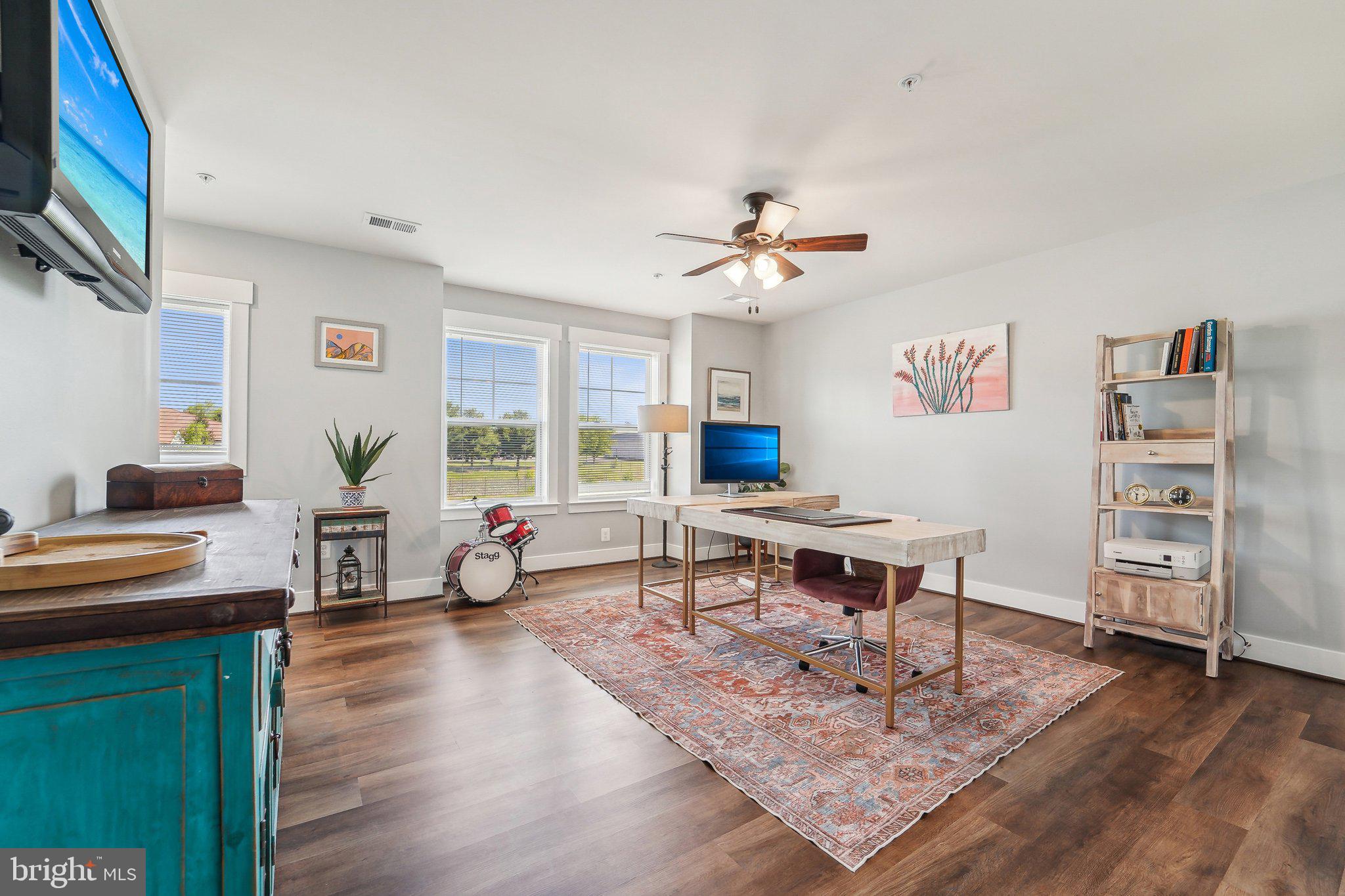 531 Highmeadow Drive Severn, MD 21144 - Photo 27 of 37 a living room with furniture and a flat screen tv