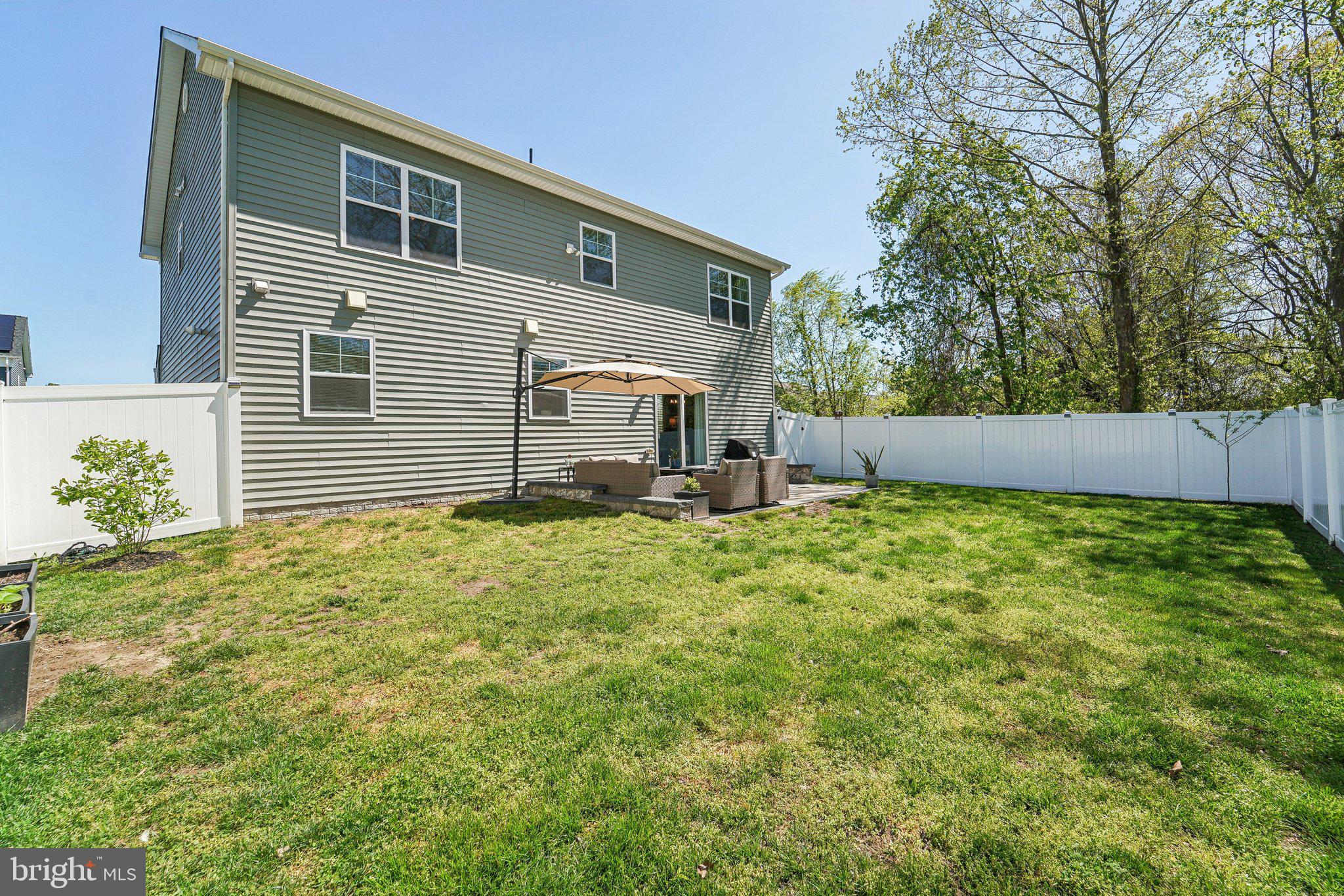 531 Highmeadow Drive Severn, MD 21144 - Photo 34 of 37 a backyard of a house with lots of green space