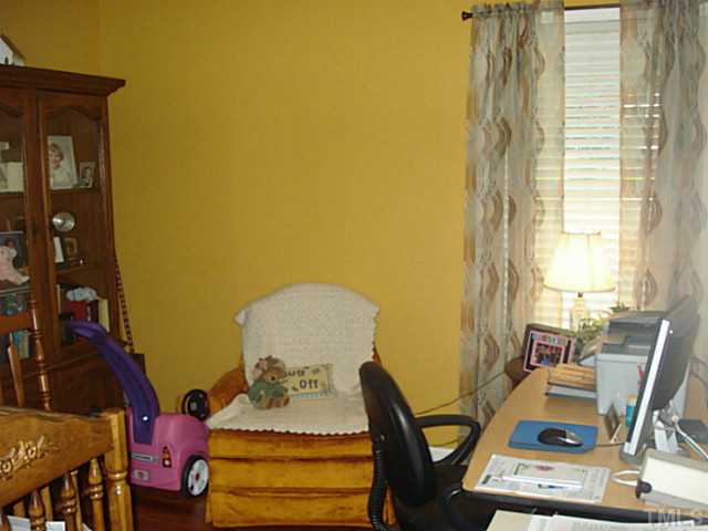 3595 Johnston County Road Angier, NC 27501 - Photo 15 of 18 a room with furniture and window