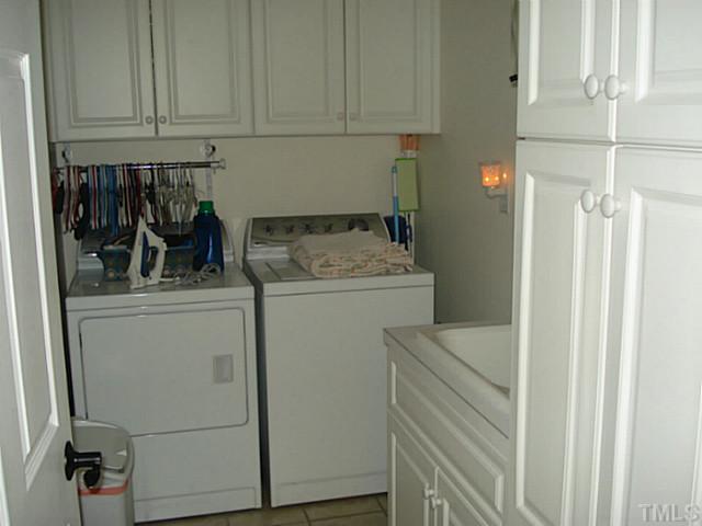 3595 Johnston County Road Angier, NC 27501 - Photo 18 of 18 a utility room with dryer and washer