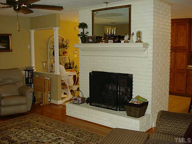 3595 Johnston County Road Angier, NC 27501 - Photo 9 of 18 a living room with furniture and a fireplace
