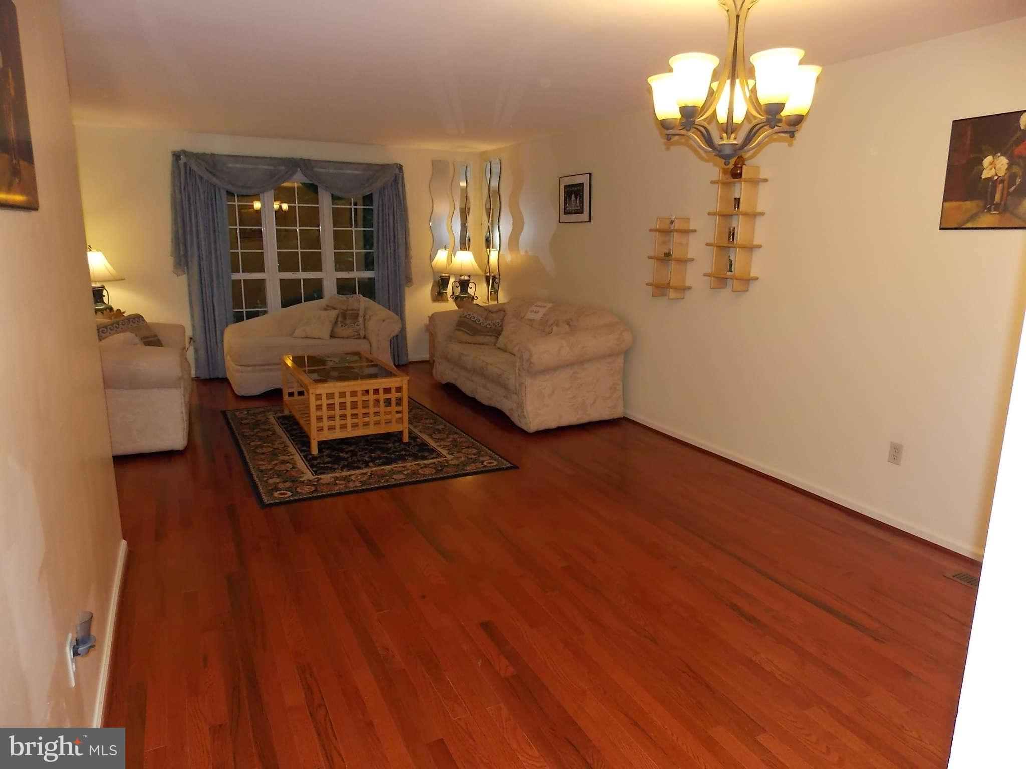 6188 Good Hunters Ride Columbia, MD 21045 - Photo 8 of 28 Living Room from dining room