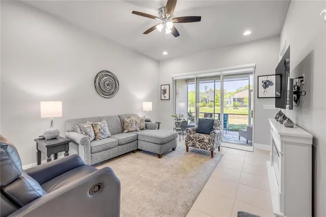 a kitchen with stainless steel appliances granite countertop a refrigerator sink and stove