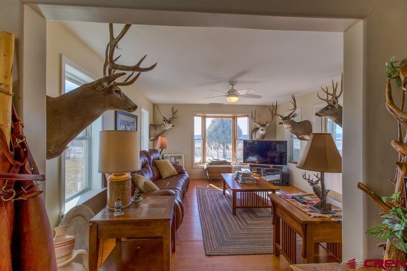 3115 Cr 973 Ignacio, CO 81137 - Photo 23 of 45 a view of a livingroom with furniture and a flat screen tv