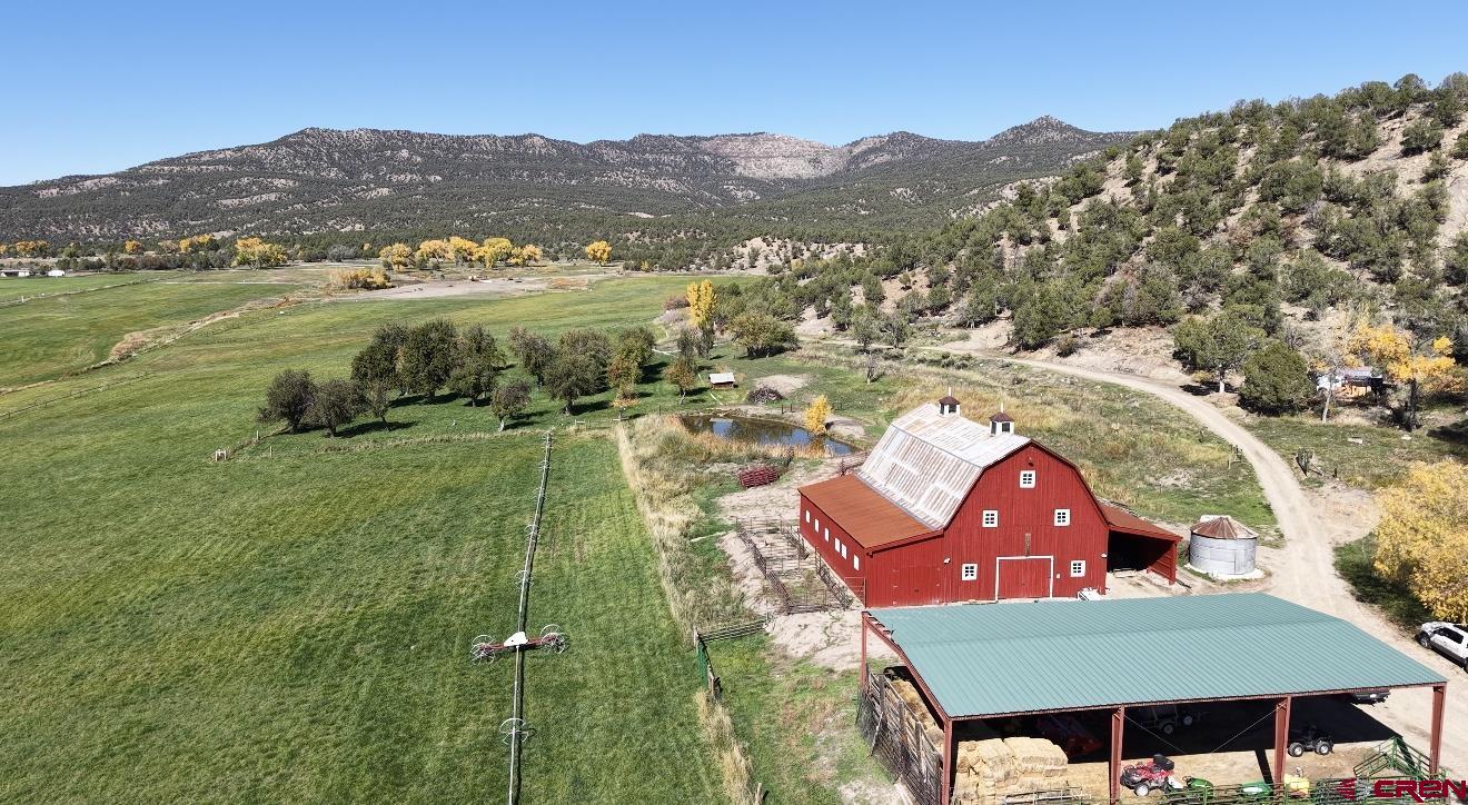 3115 Cr 973 Ignacio, CO 81137 - Photo 7 of 45 an aerial view of residential houses and outdoor space