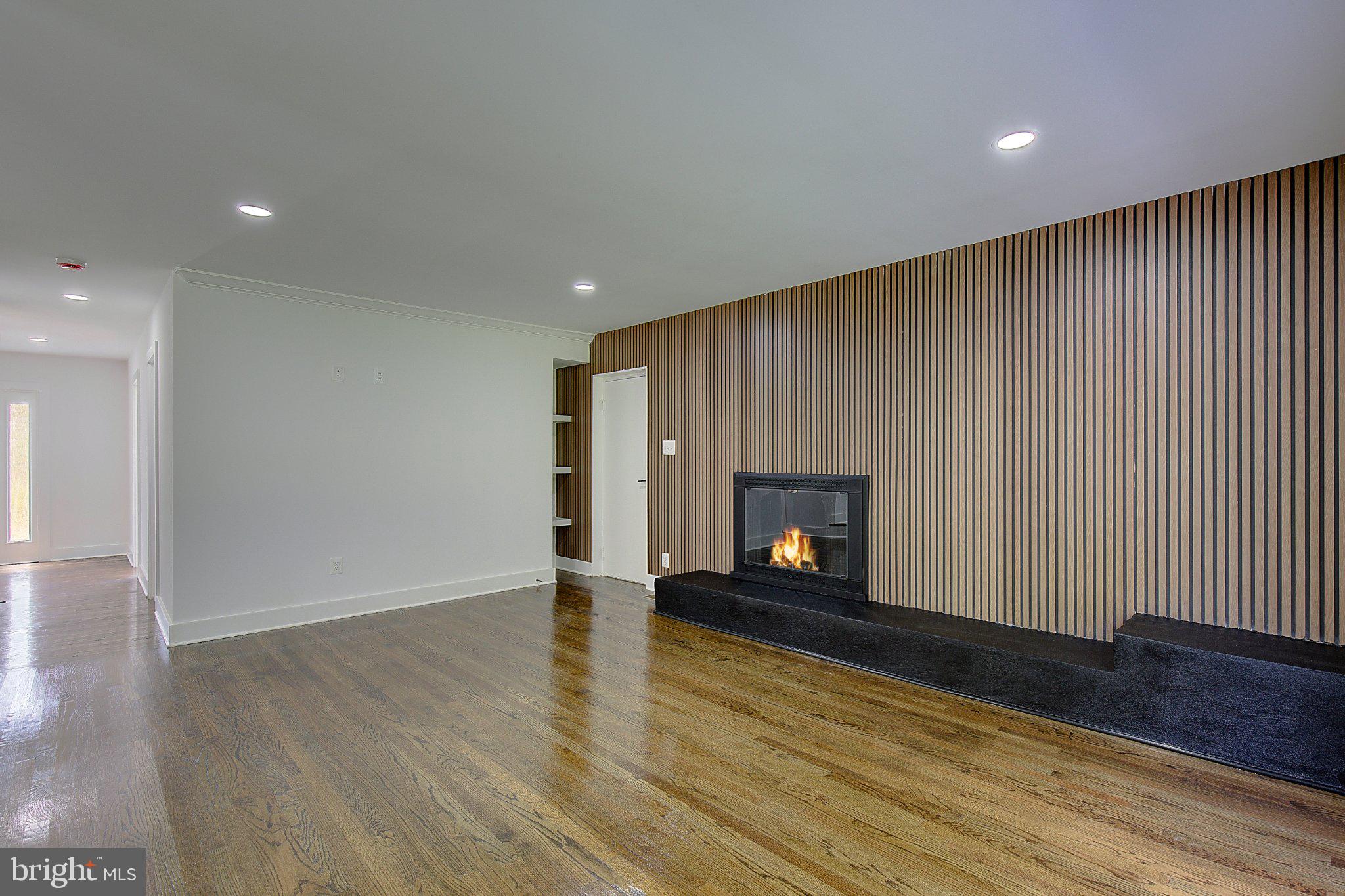 1107 Swan Creek Road Fort Washington, MD 20744 - Photo 27 of 72 Modern elegance with a cozy fireplace.