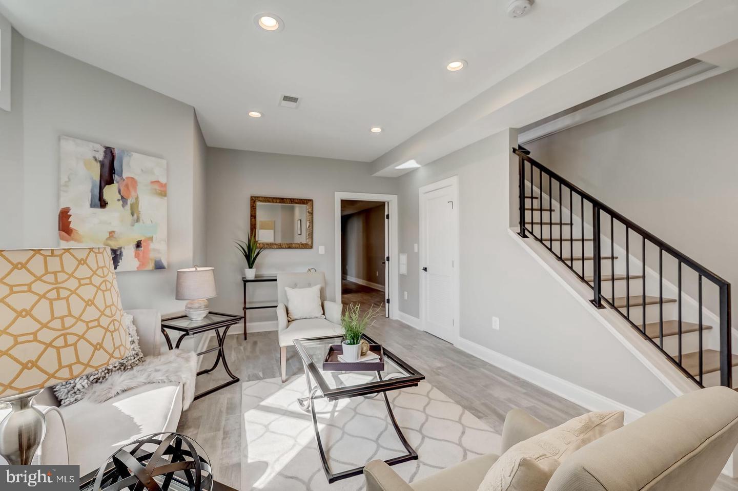 319 R Street Northwest Washington, DC 20001 - Photo 23 of 33 a living room with furniture and wooden floor