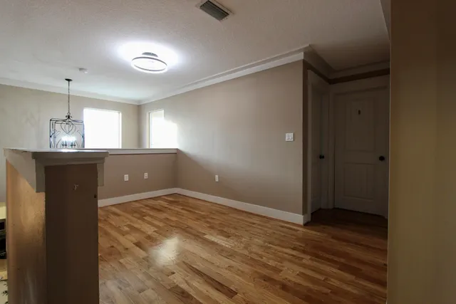 a view of an empty room and window