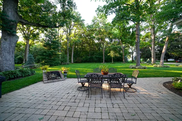 a view of a yard with sitting area and furniture