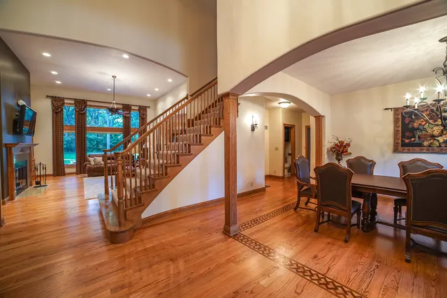 a view of a livingroom with furniture and a workspace