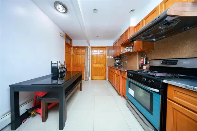 a kitchen with stainless steel appliances granite countertop lots of counter top space