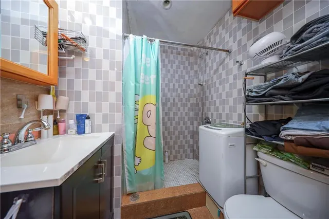 a bathroom with a sink and toilet