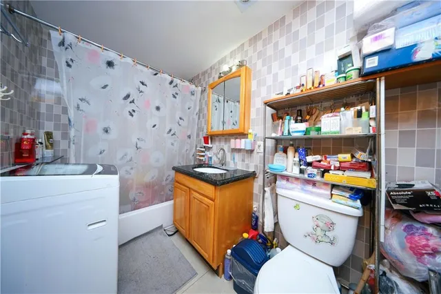 a storage room with washer and dryer