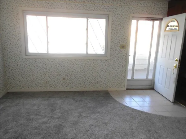 an empty room with windows