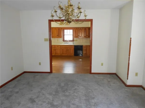 an empty room with a bathroom