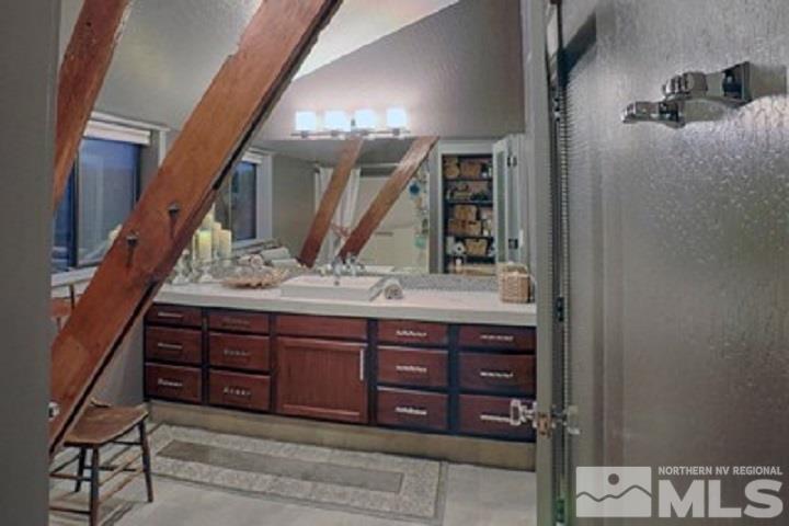 255 Curnow Canyon Road Reno, NV 89510 - Photo 8 of 25 a bathroom with a sink and a mirror