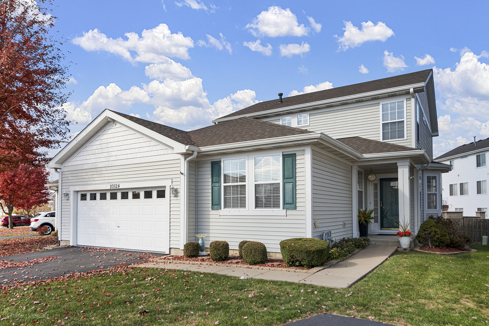 a view of a house with a yard
