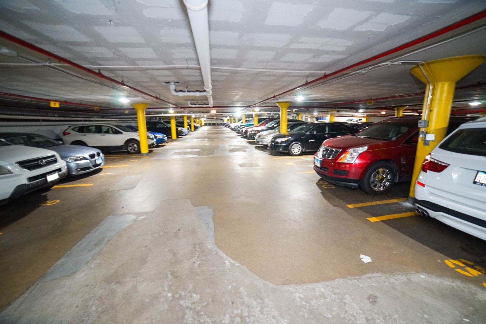 6301 North Sheridan Road, Unit 22N Chicago, IL 60660 - Photo 9 of 9 a view of parking garage with cars
