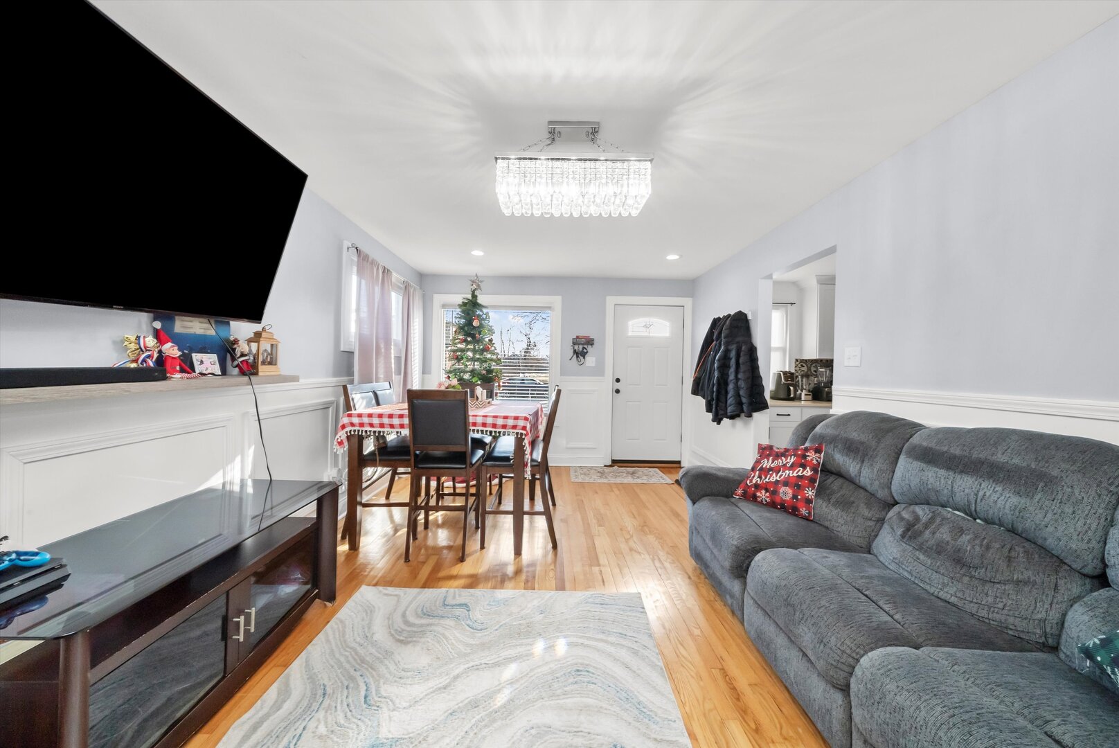 2920 141st Street Blue Island, IL 60406 - Photo 3 of 21 a living room with furniture and a flat screen tv