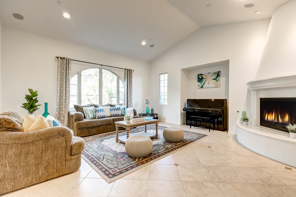 501 Luminous Irvine, CA 92603 - Photo 13 of 53 a living room with furniture and a fireplace