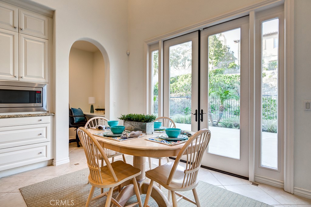 501 Luminous Irvine, CA 92603 - Photo 26 of 53 a view of a dining room with furniture window and outside view