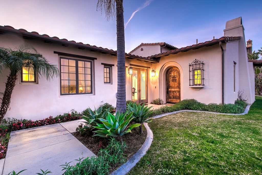 501 Luminous Irvine, CA 92603 - Photo 3 of 53 a front view of a house with garden