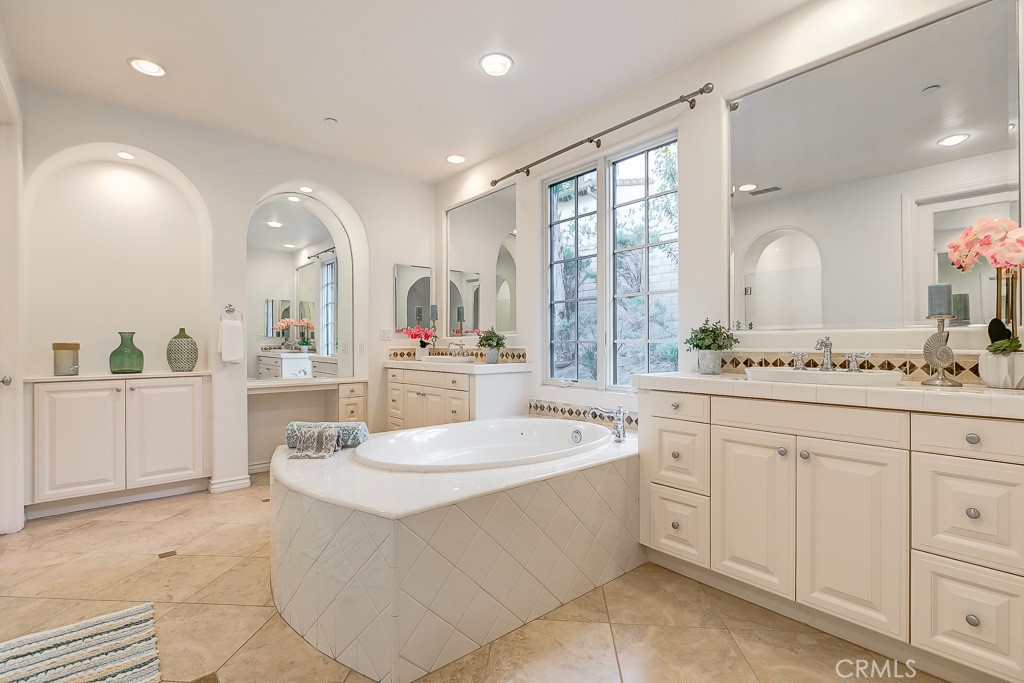 501 Luminous Irvine, CA 92603 - Photo 33 of 53 a large white kitchen with a white cabinets