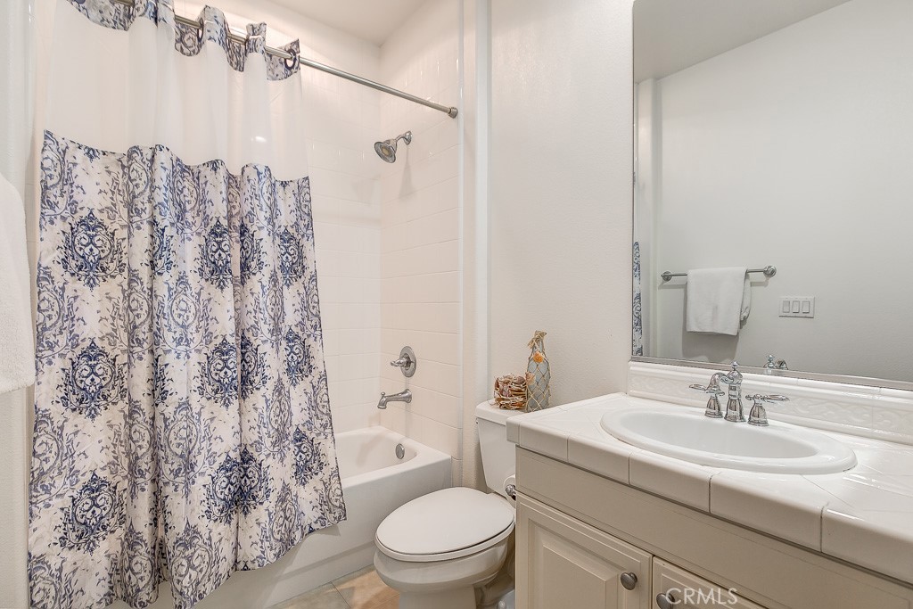 501 Luminous Irvine, CA 92603 - Photo 37 of 53 a bathroom with a sink toilet and shower