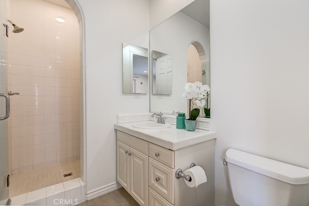 501 Luminous Irvine, CA 92603 - Photo 41 of 53 a bathroom with a sink vanity mirror and toilet