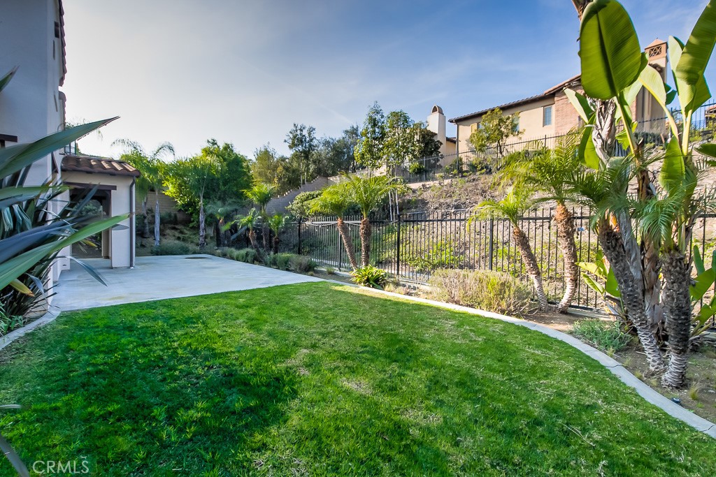 501 Luminous Irvine, CA 92603 - Photo 45 of 53 a view of a garden with a bench