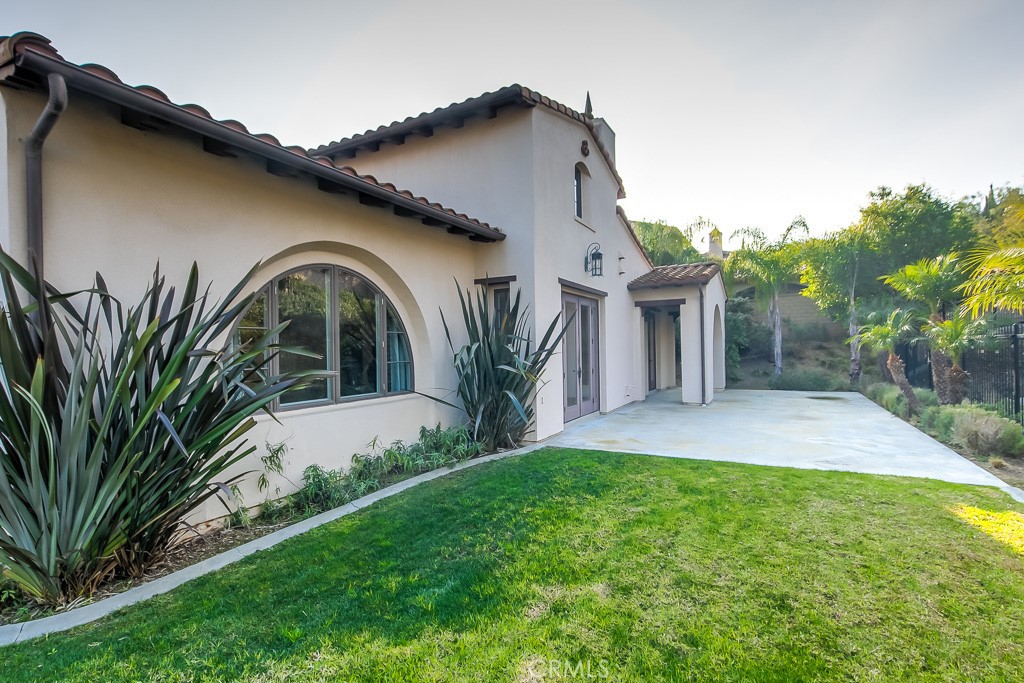 501 Luminous Irvine, CA 92603 - Photo 46 of 53 a front view of a house with garden