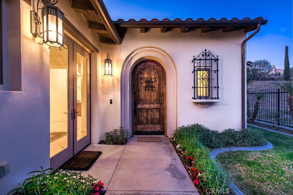 501 Luminous Irvine, CA 92603 - Photo 5 of 53 a front view of a house with a garden