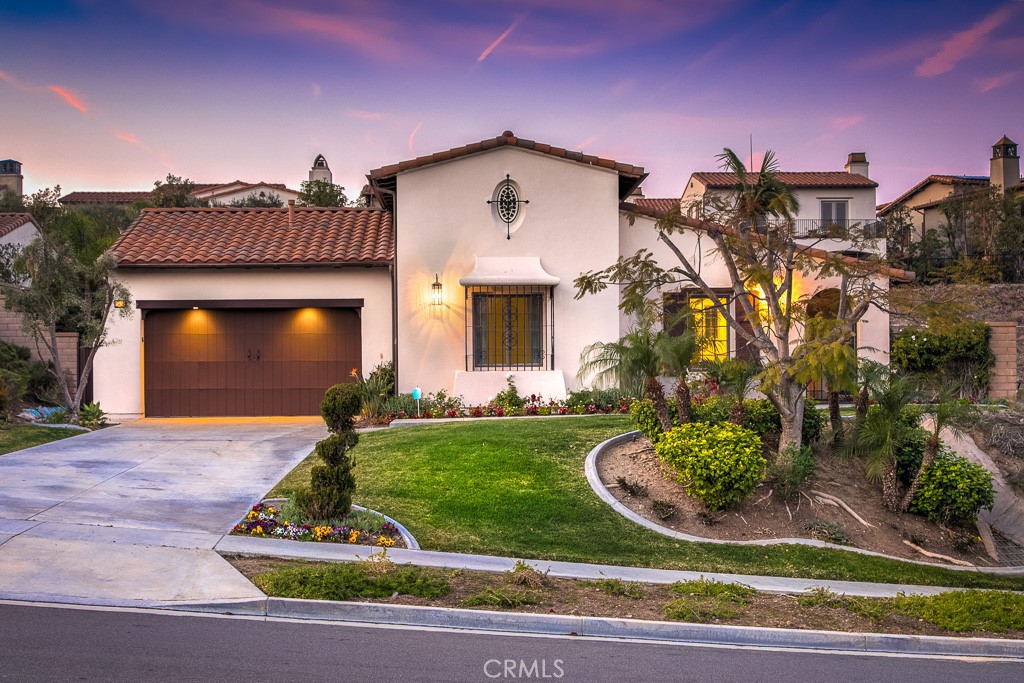 501 Luminous Irvine, CA 92603 - Photo 52 of 53 a front view of a house with a yard
