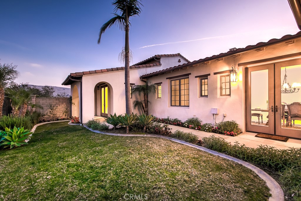 501 Luminous Irvine, CA 92603 - Photo 6 of 53 a front view of a house with garden