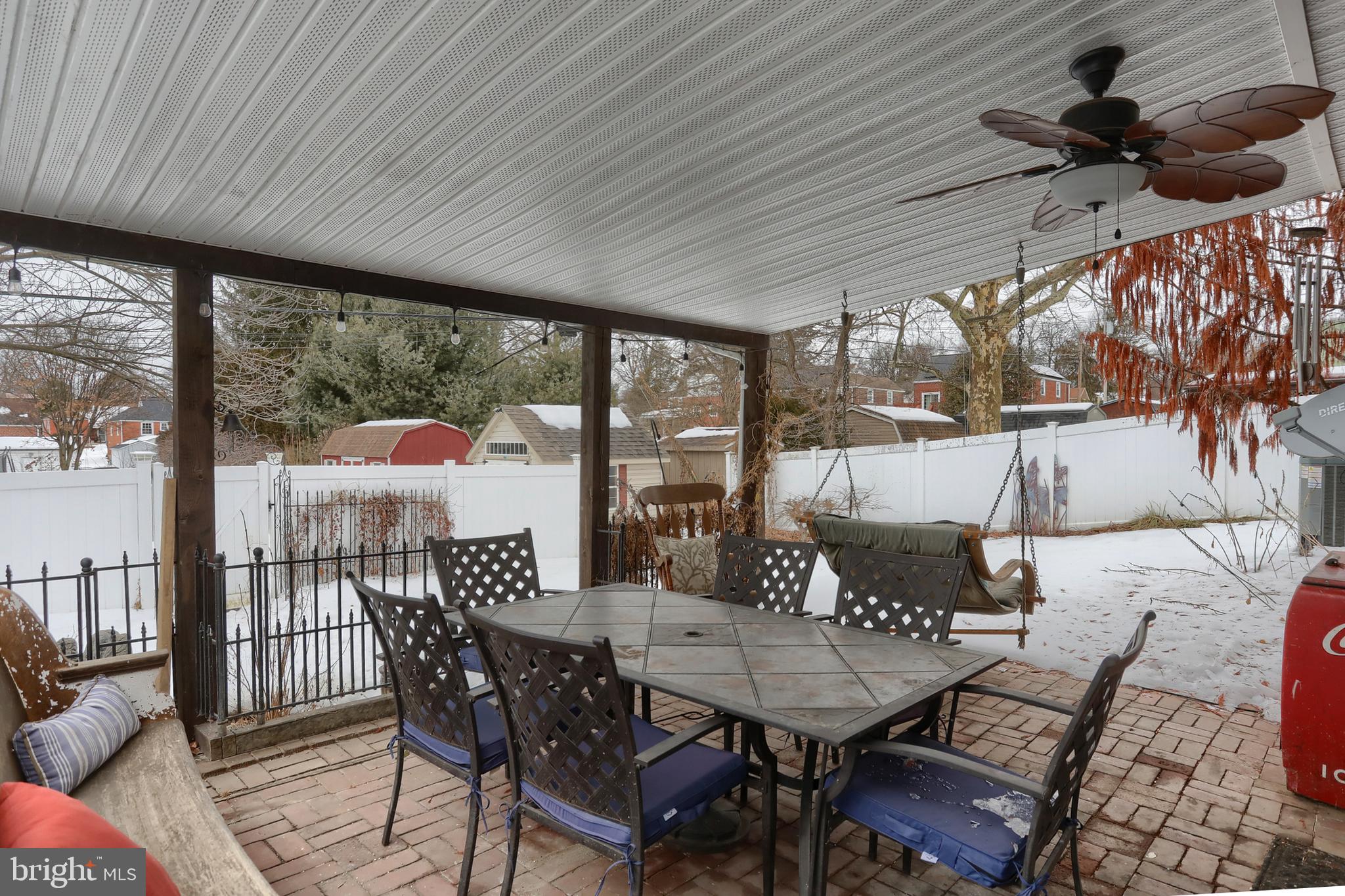 323 South 3rd Avenue Lebanon, PA 17042 - Photo 3 of 33 a view of a patio with a table chairs and a potted plant