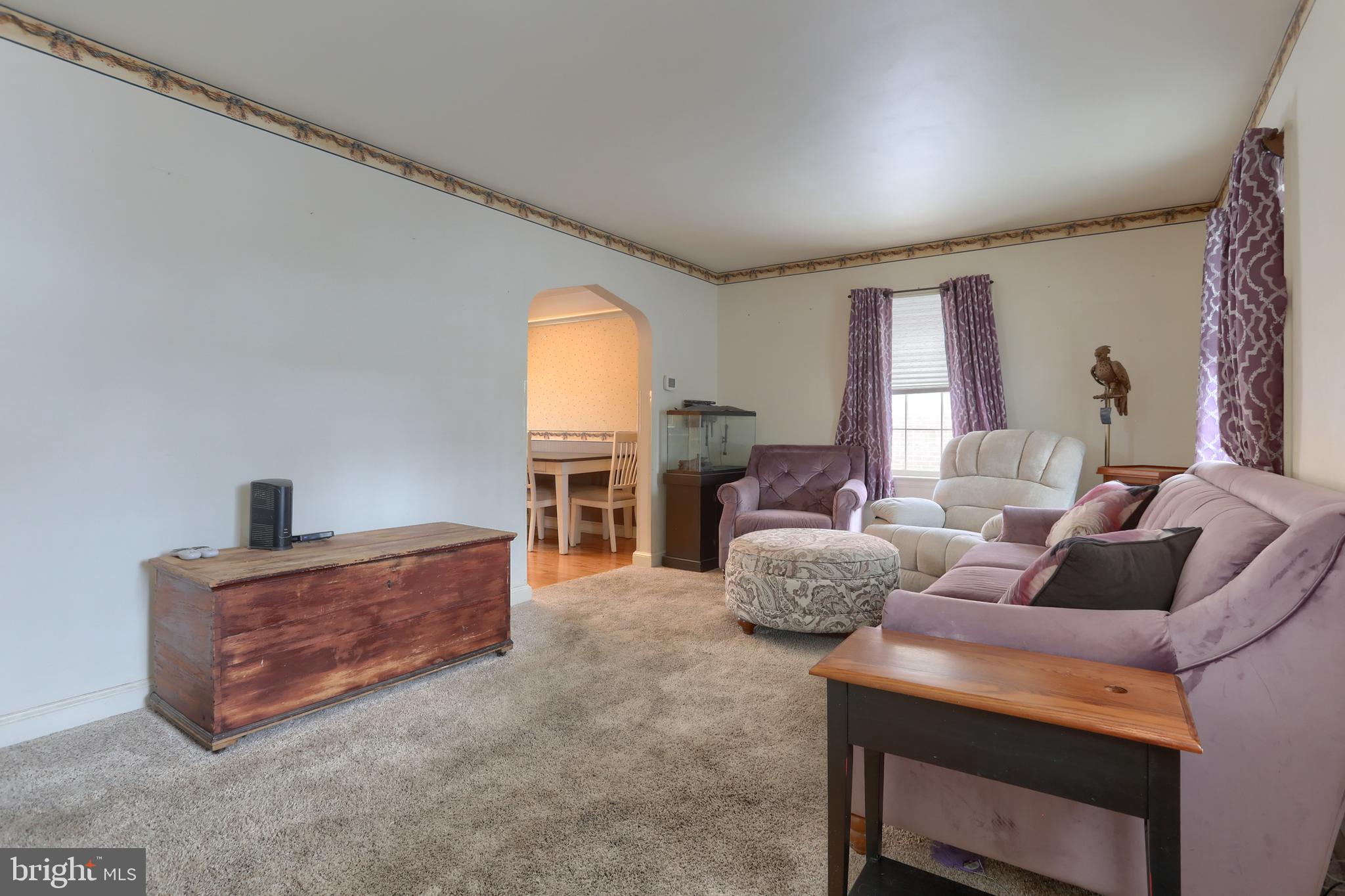 323 South 3rd Avenue Lebanon, PA 17042 - Photo 5 of 33 a living room with furniture and a fireplace