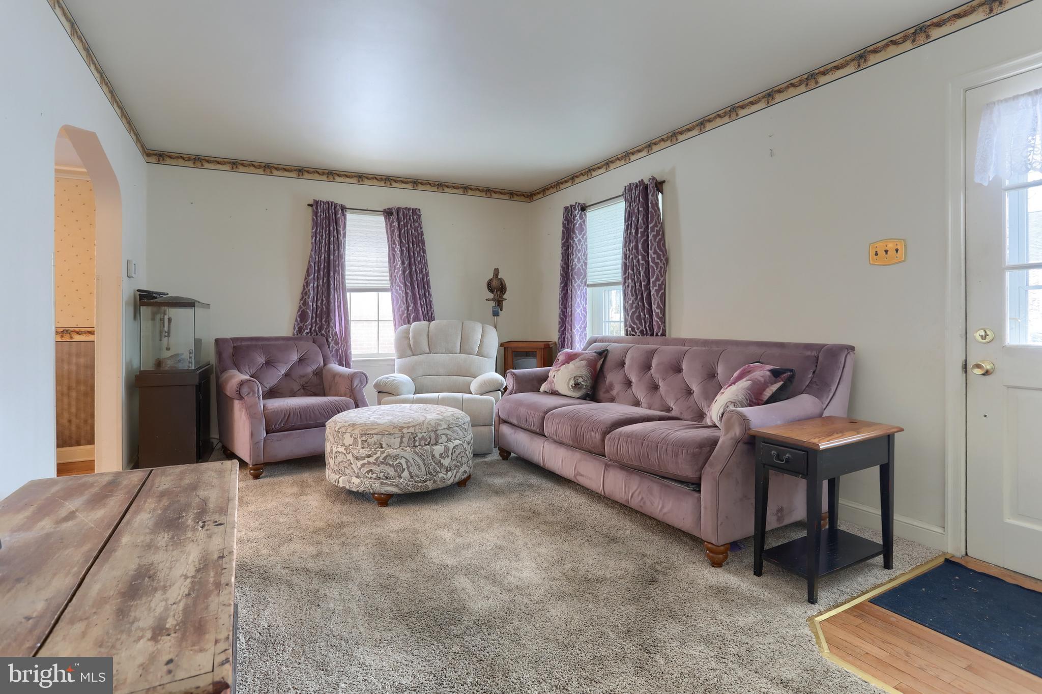 323 South 3rd Avenue Lebanon, PA 17042 - Photo 6 of 33 a living room with a couch and a window