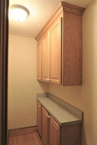 a room with a sink and a mirror