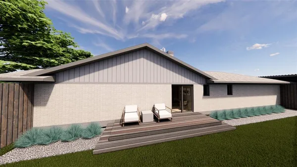 a view of backyard of a house