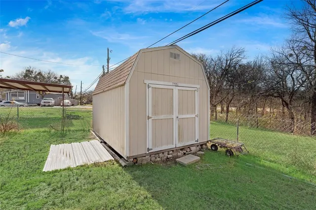a view of a backyard with a garden