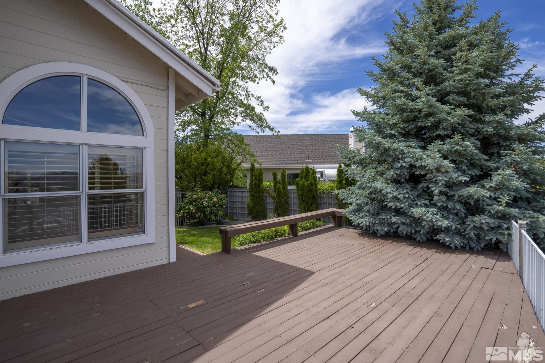 6172 Squires Lane Reno, NV 89519 - Photo 35 of 40 a view of outdoor space with deck and yard