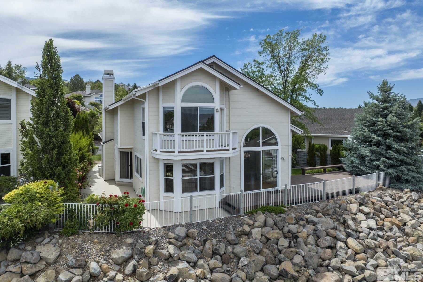 6172 Squires Lane Reno, NV 89519 - Photo 40 of 40 a front view of a house with garden