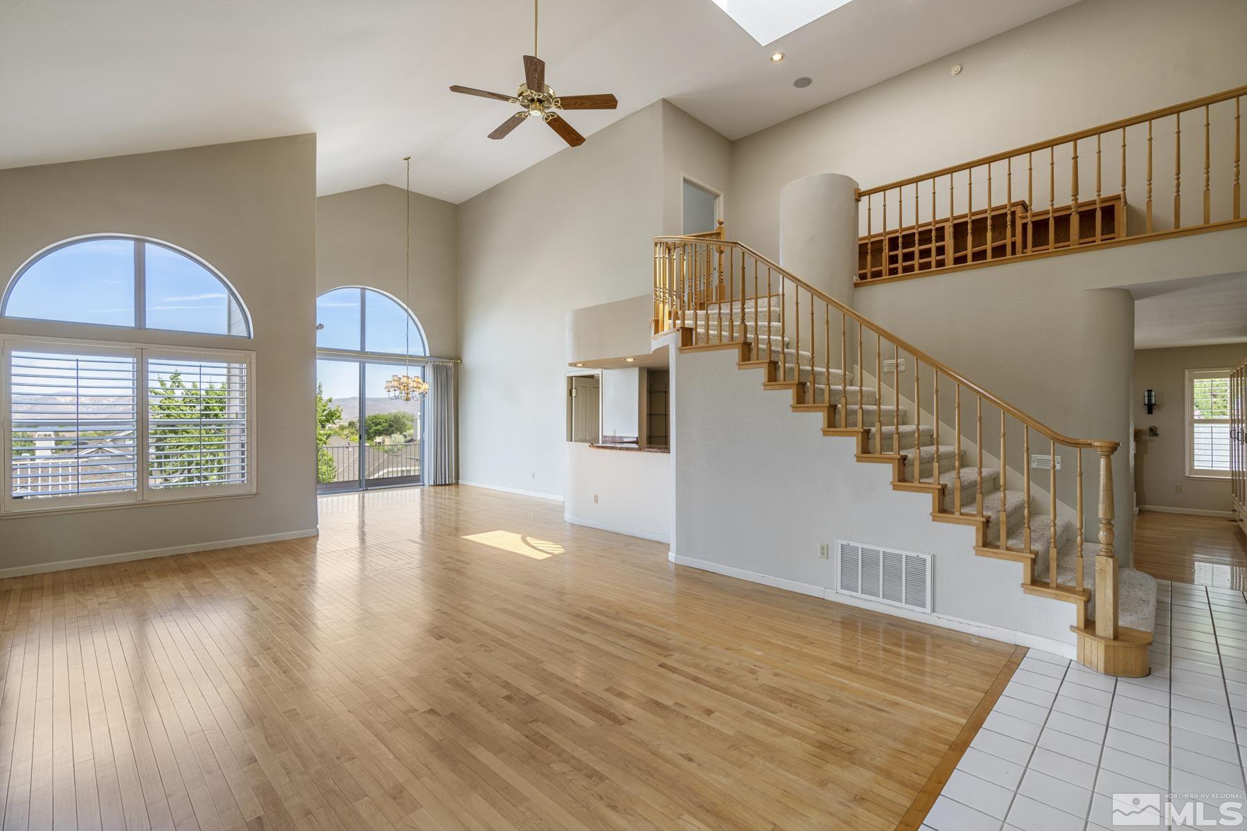 6172 Squires Lane Reno, NV 89519 - Photo 5 of 40 a view of entryway and hall with wooden floor